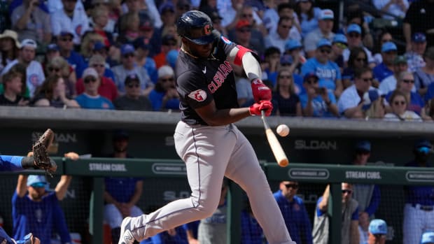 Mar 3, 2024; Mesa, Arizona, USA; Cleveland Guardians outfielder Jhonkensy Noel (78) hits a single against the Chicago Cubs in the third inning at Sloan Park.